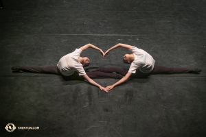 They love performing for you! Dancers Elsie Shi (L) and Olivia Chang from the Shen Yun International Company warm up onstage before one of the last performances in their homeland—Taiwan. (Photo by dancer Kexin Li) 