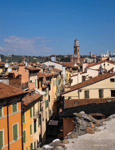From the other side of the amphitheater you can see the Torre dei Lamberti&mdash;an over 800-year-old tower. Its bells were once used to call town meetings and warn citizens of fires. (Photo by Felix Sun)